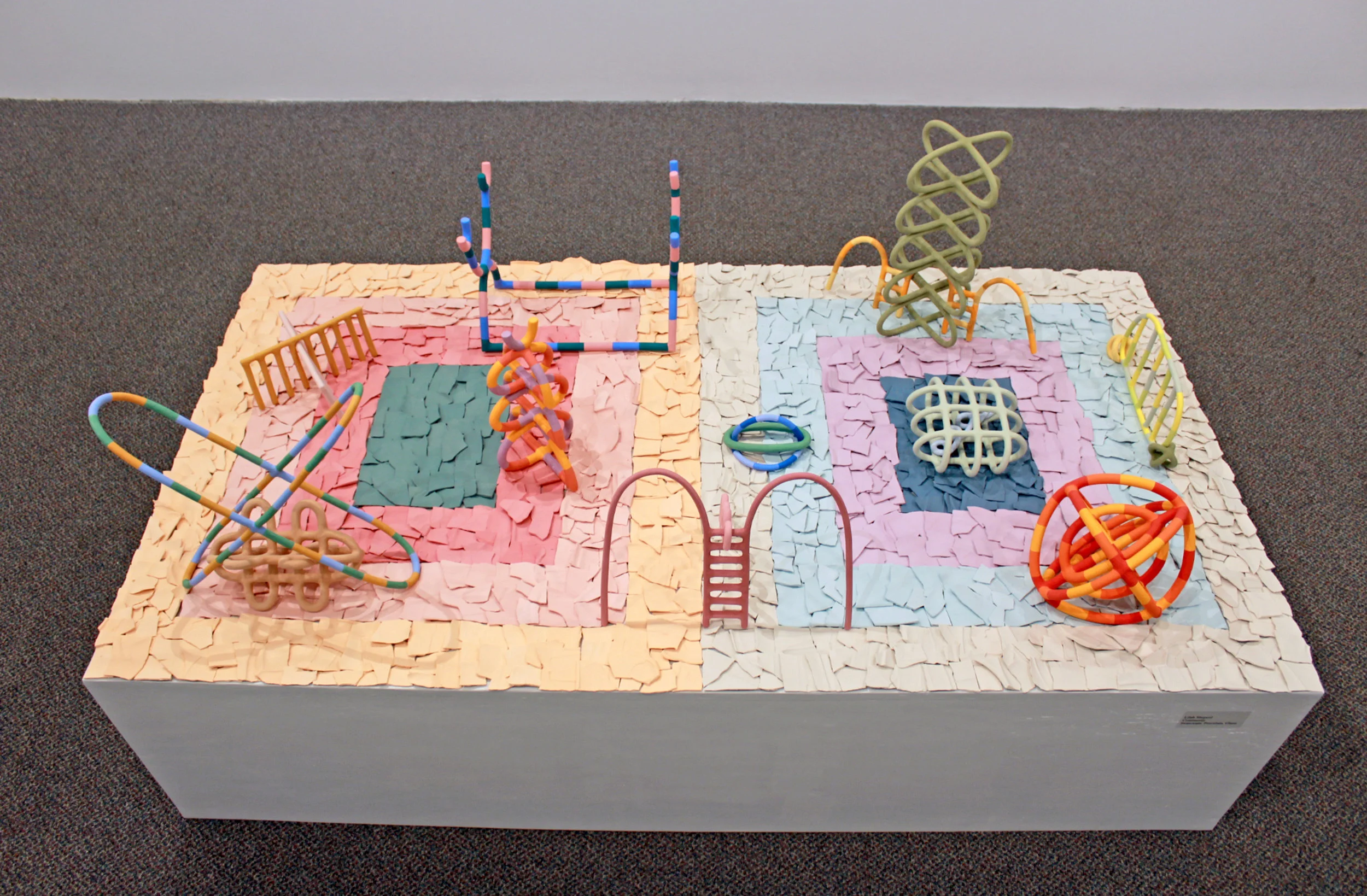 Community Ceramic, stoneware, porcelain, stains, underglaze (pedestal 18.5” x 73” x 39.5”) tallest green sculpture in composition 18.5” tall 2019