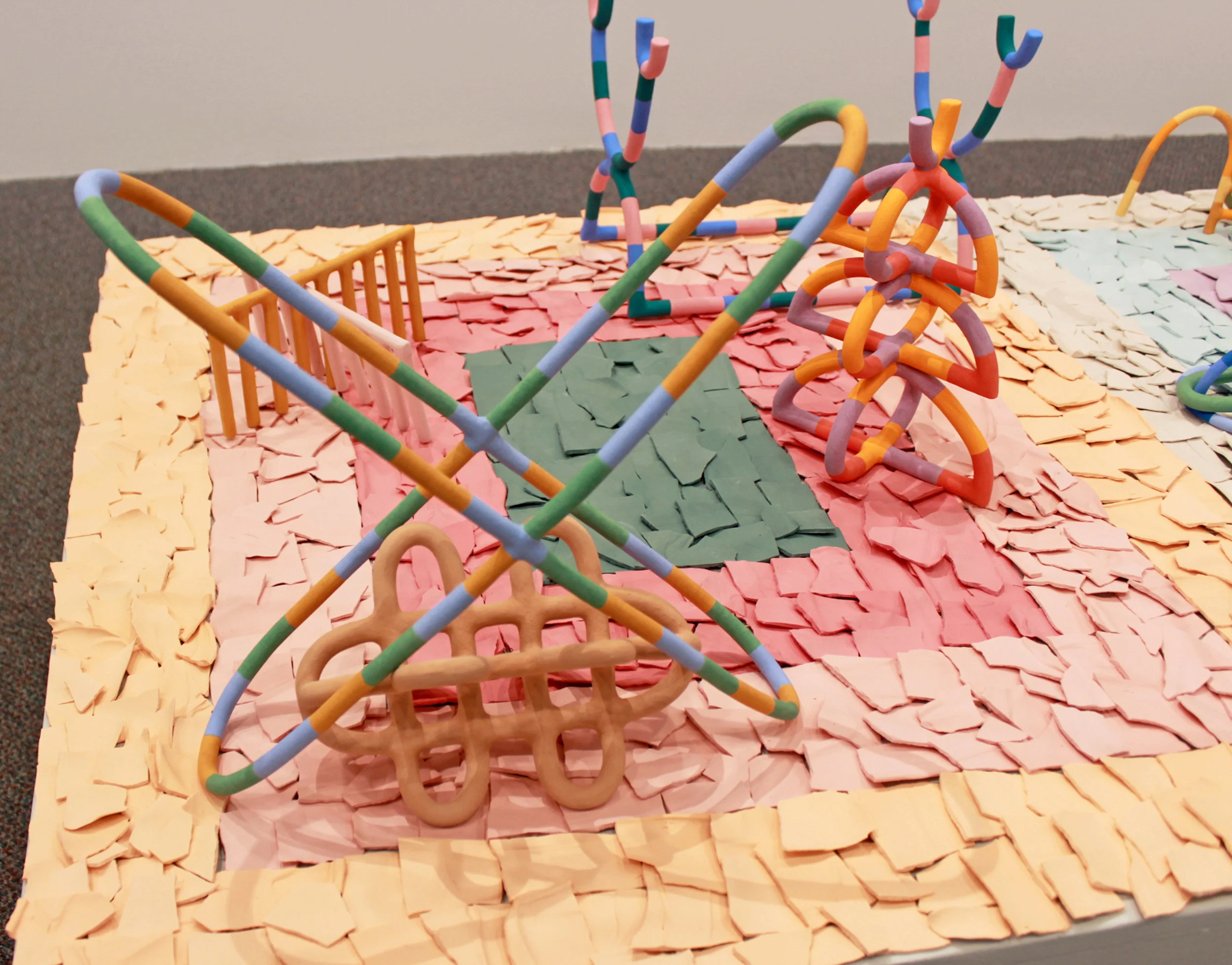 Community Ceramic, stoneware, porcelain, stains, underglaze (pedestal 18.5” x 73” x 39.5”) tallest green sculpture in composition 18.5” tall 2019