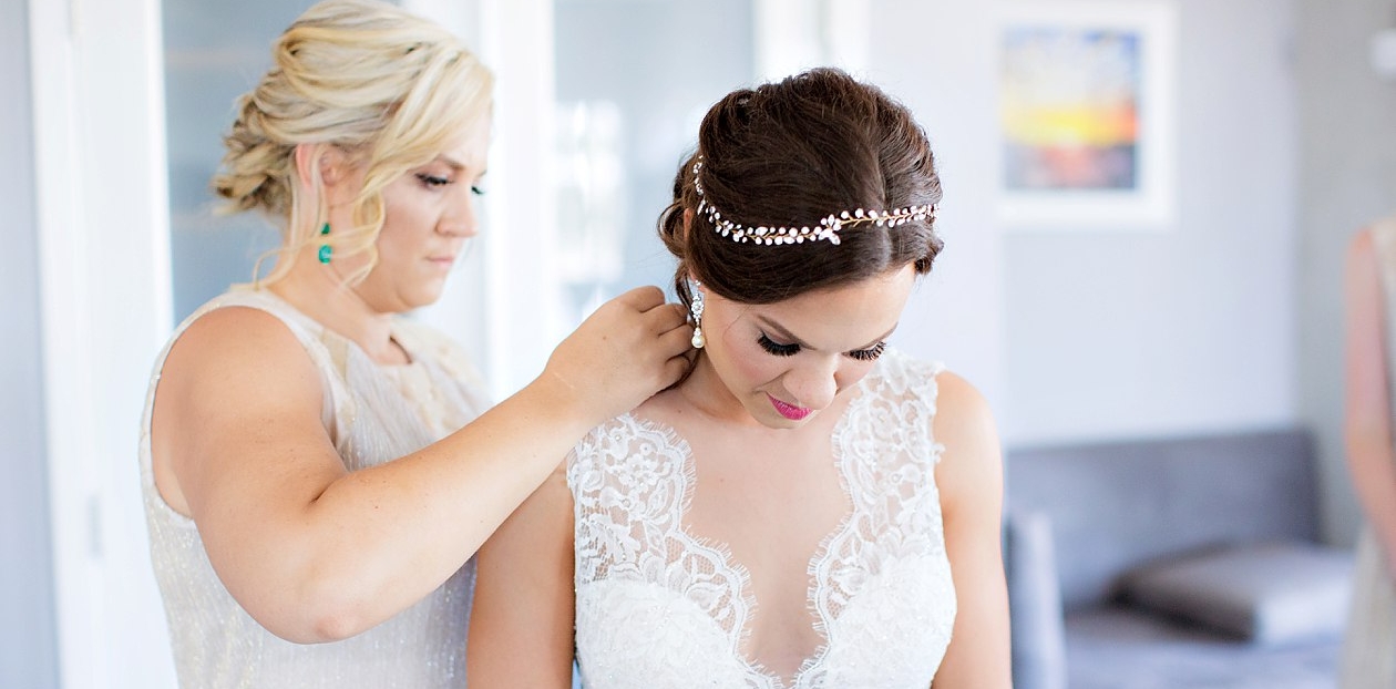 Brunette Bride with Headband Updo in Wedding Day Photos. Bridal Hairstyles and Makeup by Vanity Belle in Orange County (Costa Mesa) and San Diego (La Jolla)