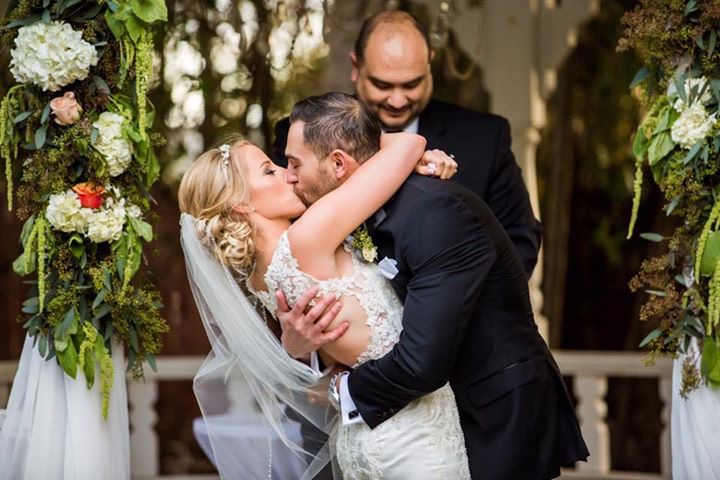 Wedding Photography with Husband & Wife Kissing. Bridal Hair and Makeup by Vanity Belle in Orange County (Costa Mesa) and San Diego (La Jolla)