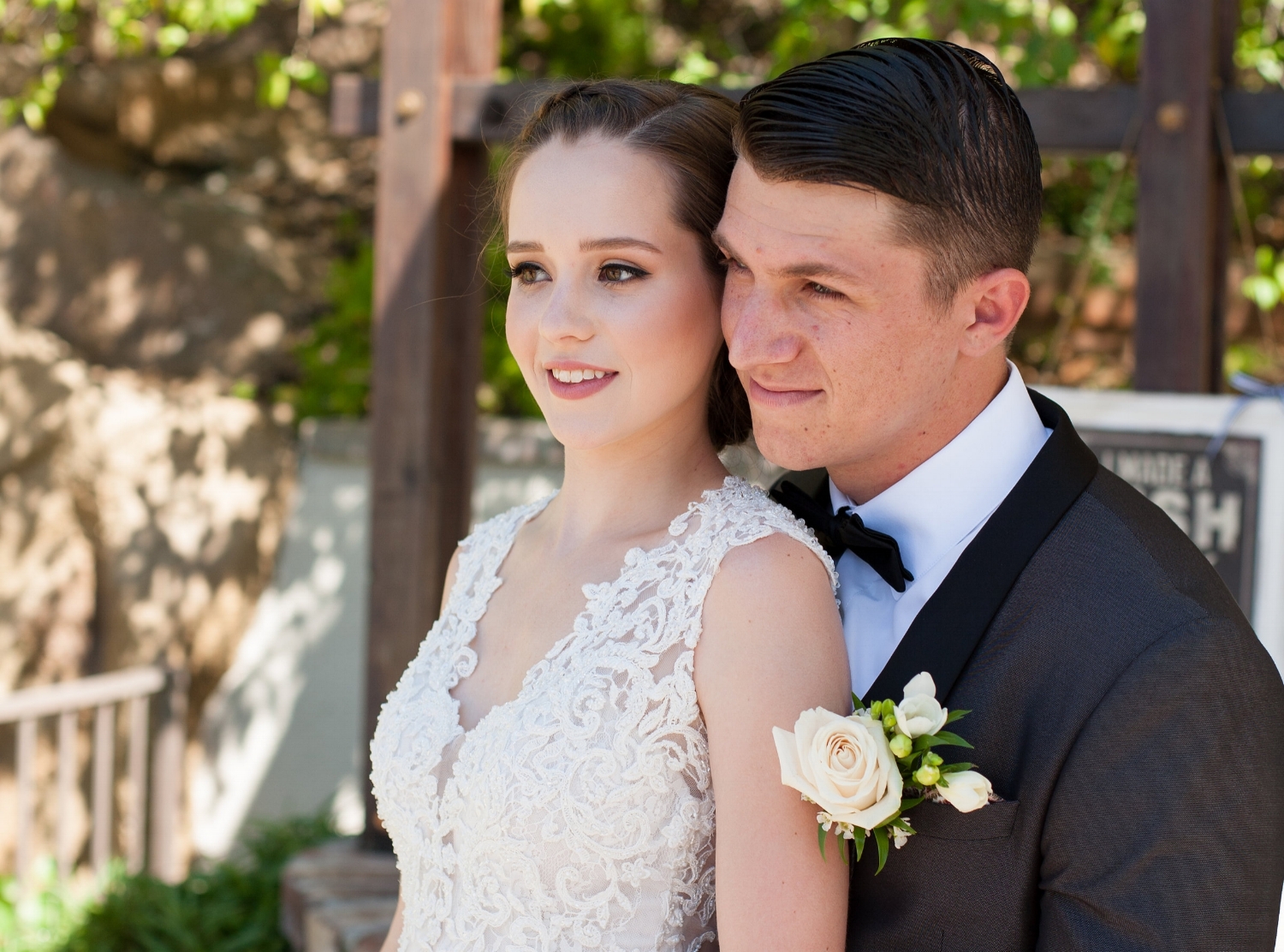Wedding Day Photos of Young Brunette Bride with Natural Makeup and Braided Updo. Bridal Hair and Beauty by Vanity Belle in Orange County (Costa Mesa) and San Diego (La Jolla)