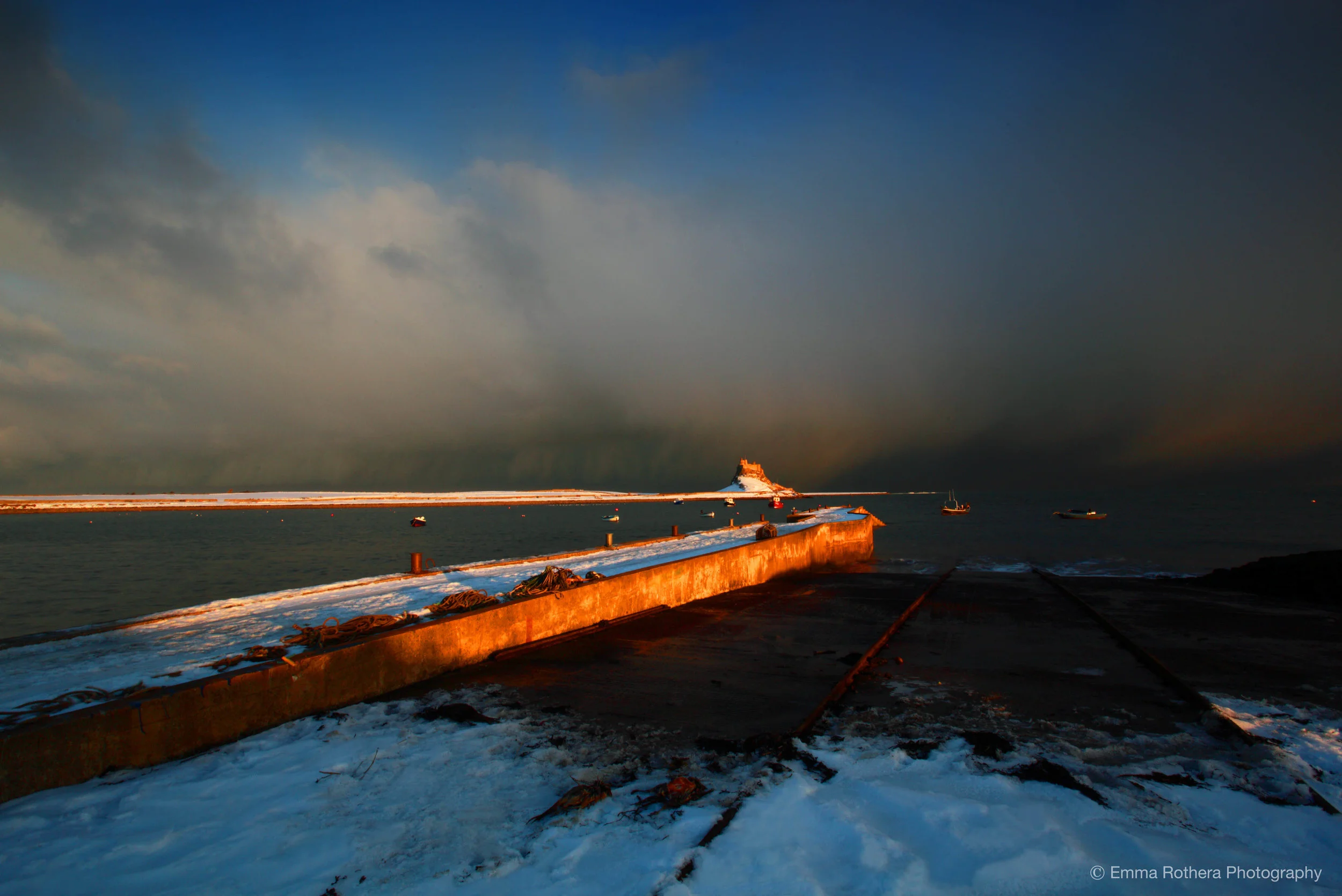 Harbour Wall, Lindisfarne Castle View, Golden Hour Snow, Holy Island, Northumberland