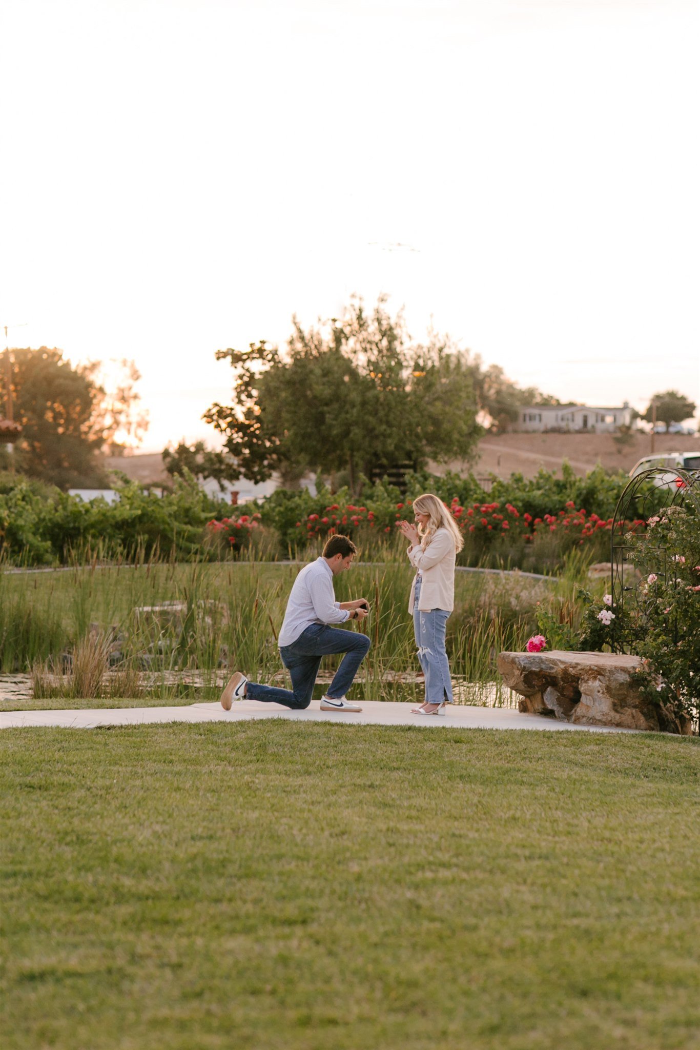 guy getting down on one knee to girl at temecula California winery