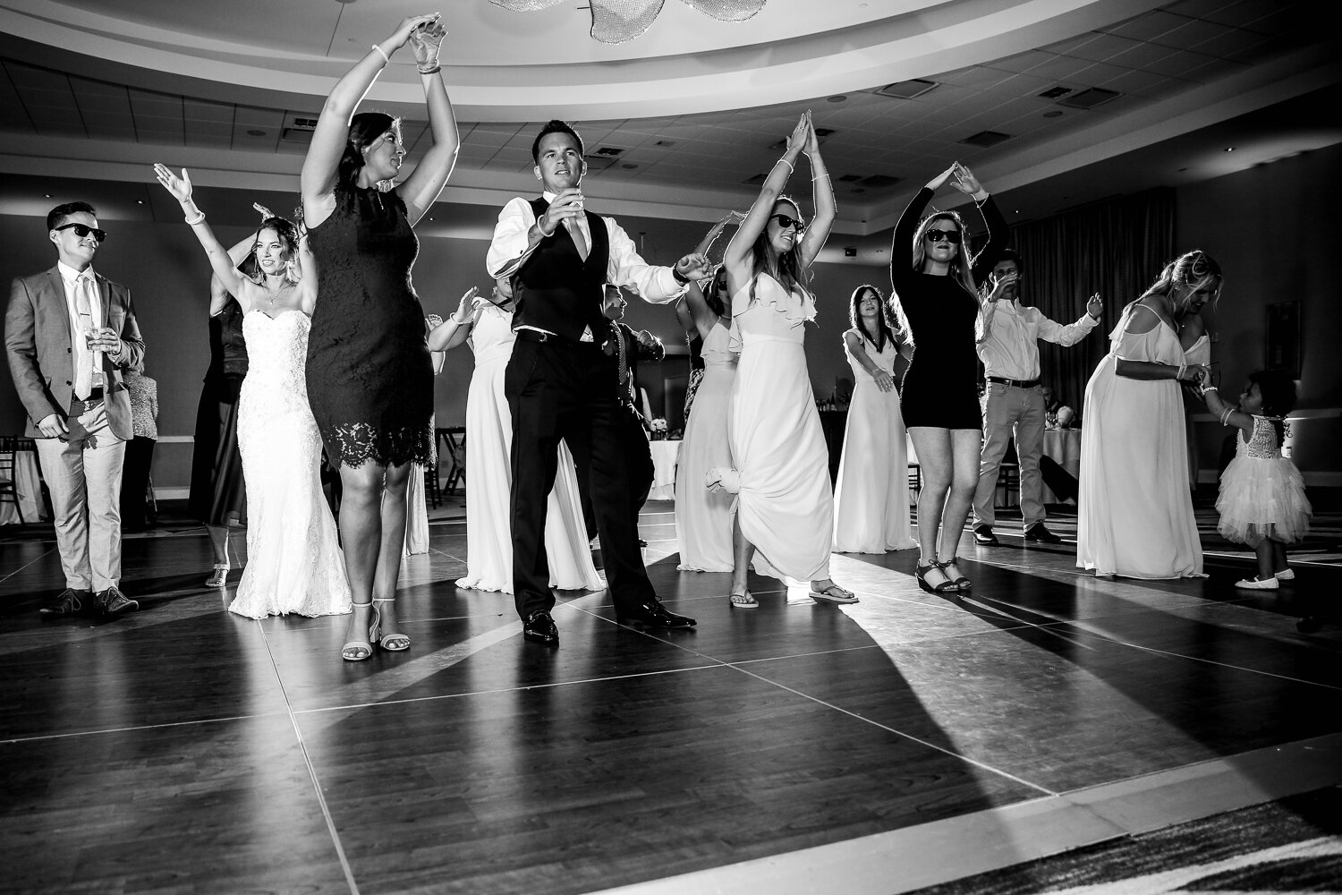 bride and groom dancing black and white