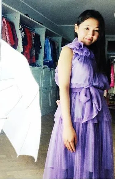 PLAKINGER @Byplakinger · Düsseldorf, Germany ( Mar. 14, 2019 ) @byplakinger :The lilac dress is all about spring, made from a soft tulle in a playfully, layered silhouette. Thank you @sifeiwen for wearing it .