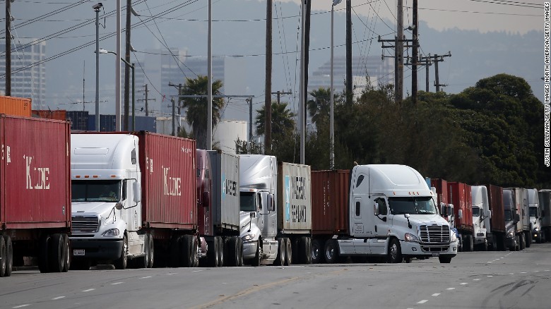 Trucks line up to make deliveries in Oakland, California.