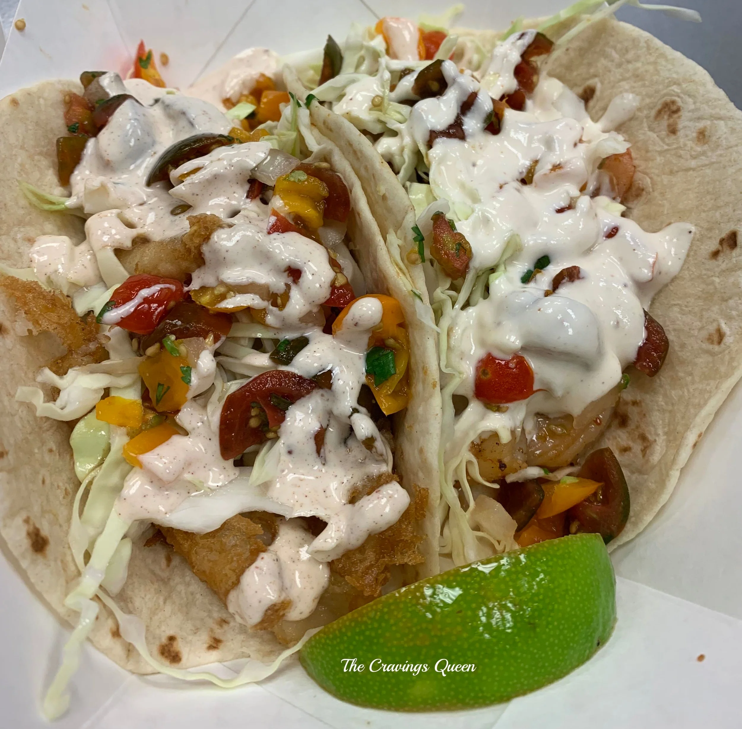 The Truth taco (left) and Shrimpin’ Ain’t Easy taco (right)