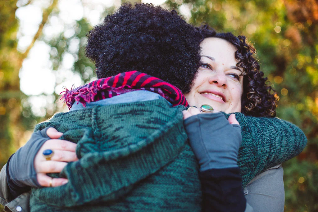 Lily and Anya Hugging.jpg