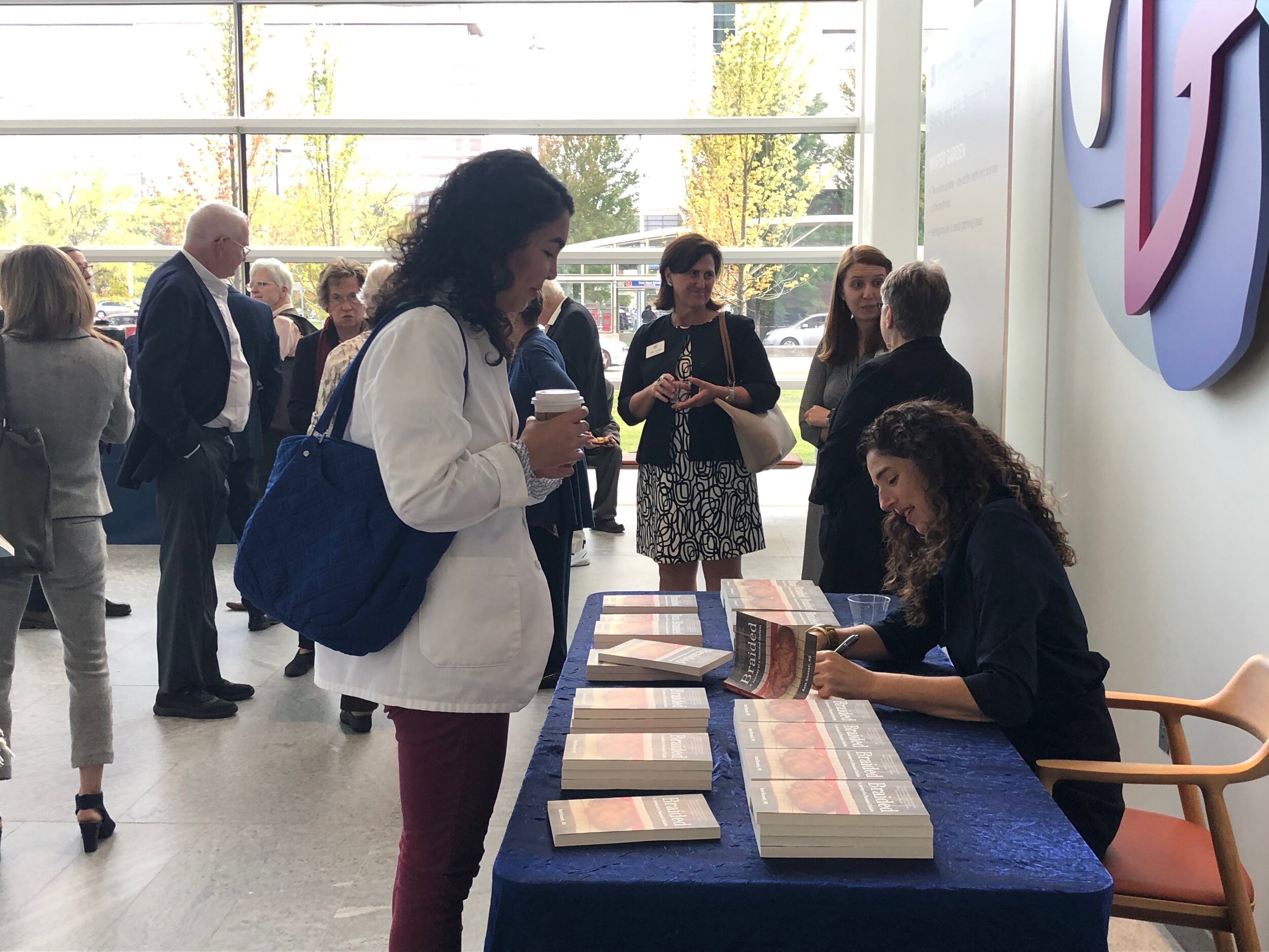 Beth Ricanati MD meeting fans and signing book copies