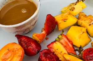 Adam Moore's CHARGRILLED FRUIT SKEWERS WITH MISO CARAMEL&nbsp;