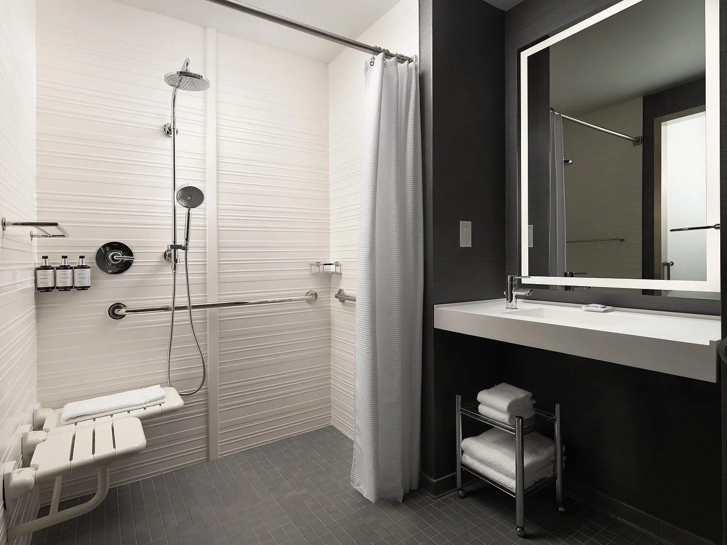 Austin AC 281 ADA roll in.JPG