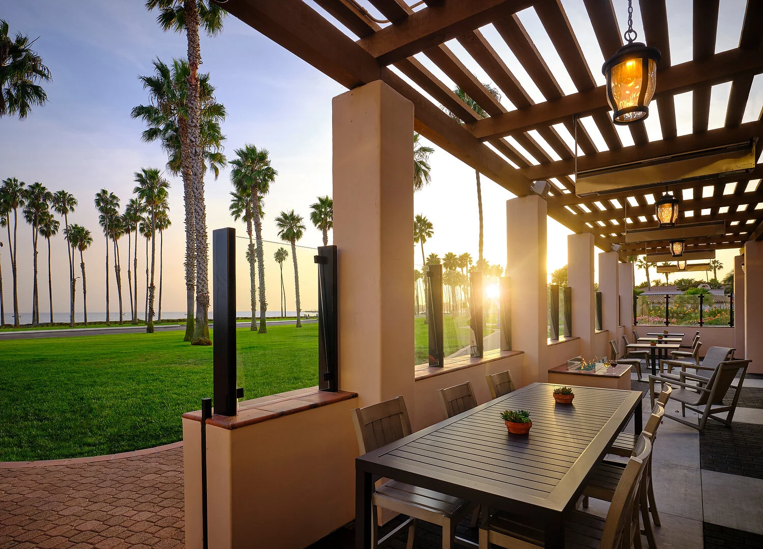 Hilton Santa Barbara patio sunset with sun.JPG