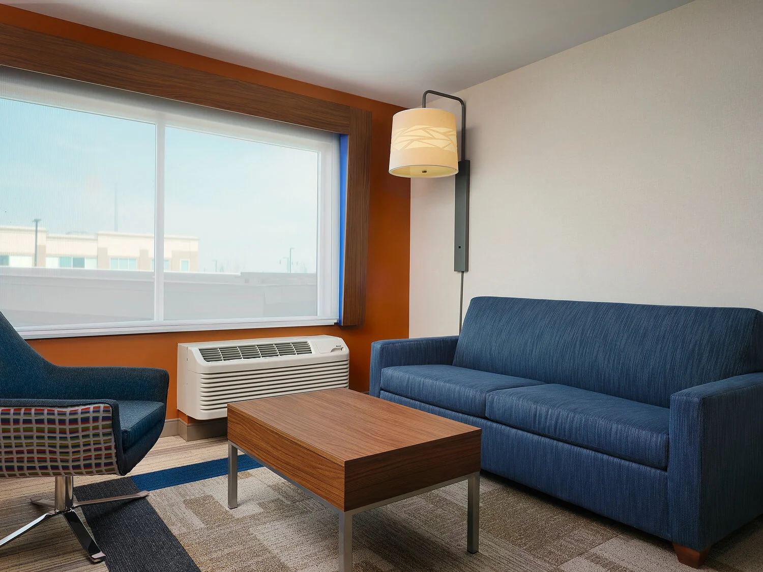 Lockport HIEX king suite sitting area.JPEG