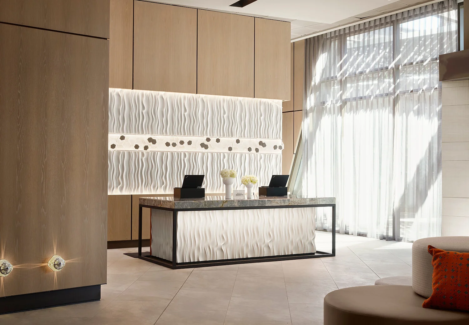 AC hotel front desk wideA - PATH.JPEG