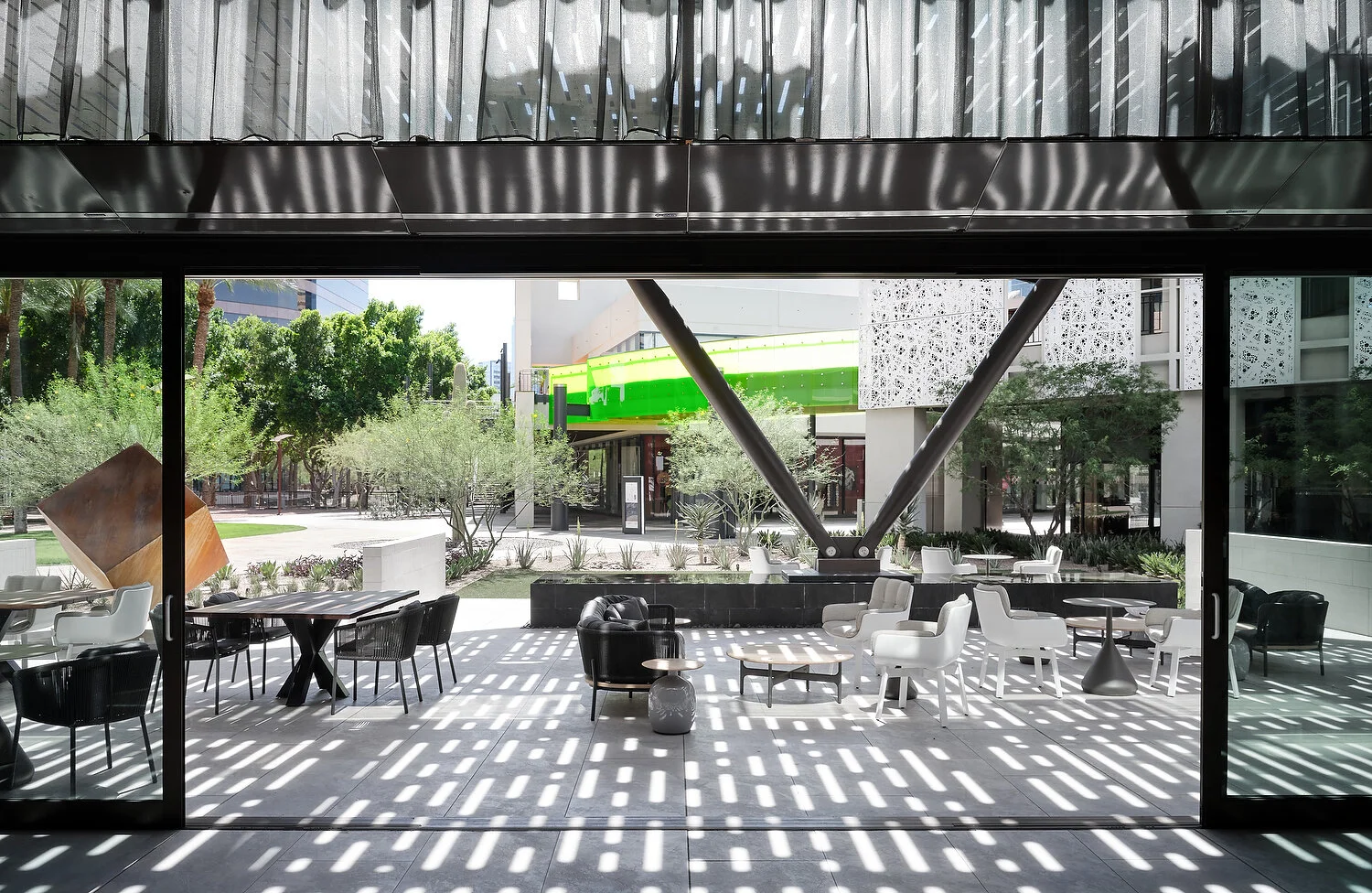 AC hotel sun dappled sidewalk.JPEG