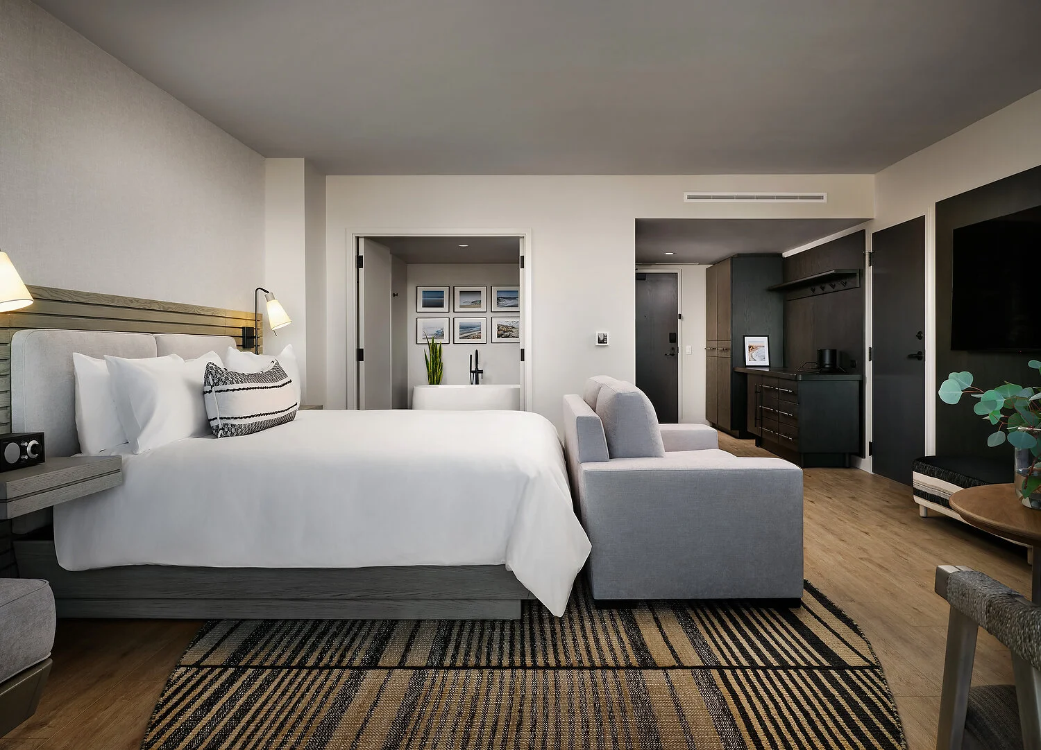 Alila room 235 studio reverse bathroom with art.JPEG