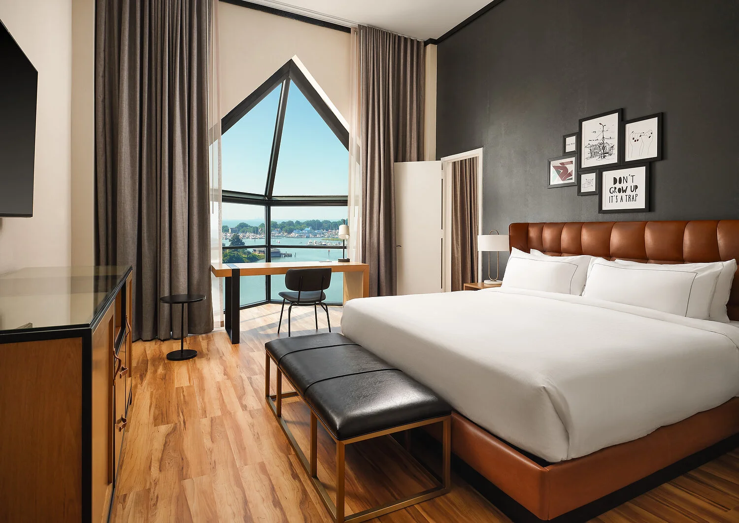 Hampton The Landing presidential suite bedroom.JPEG