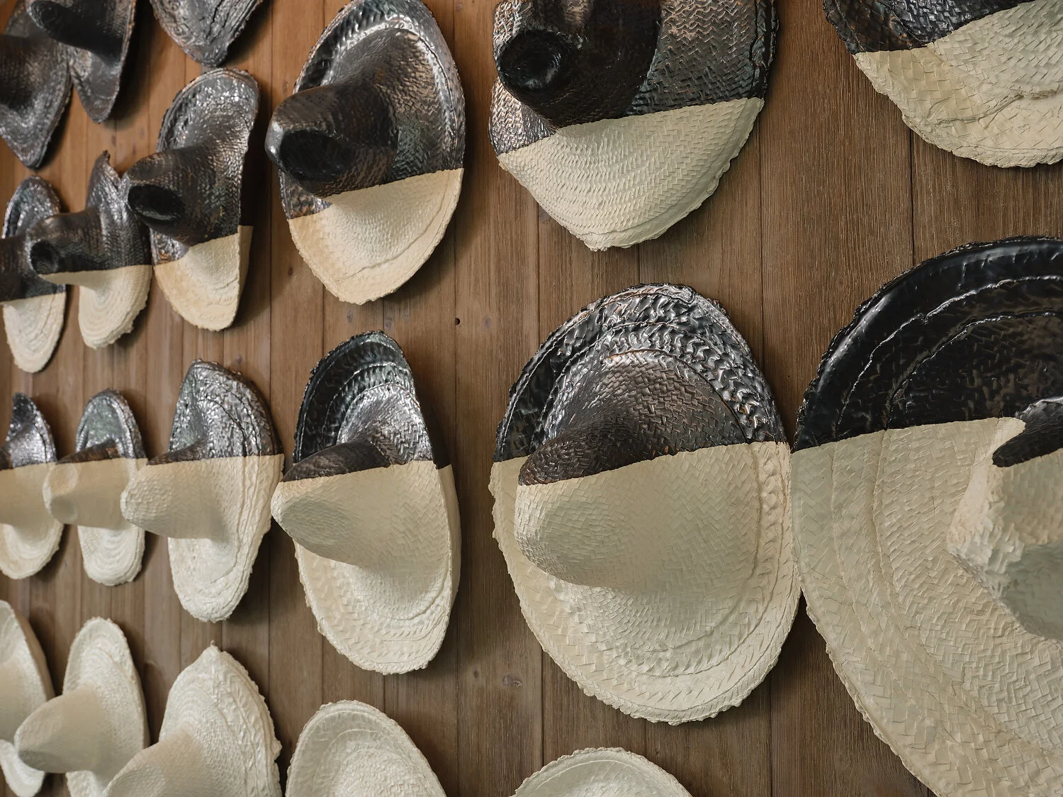 FS lobby front desk hats.JPG