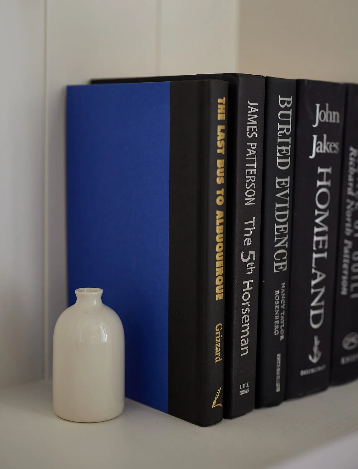 FS pottery and books in guestroom 5.JPG