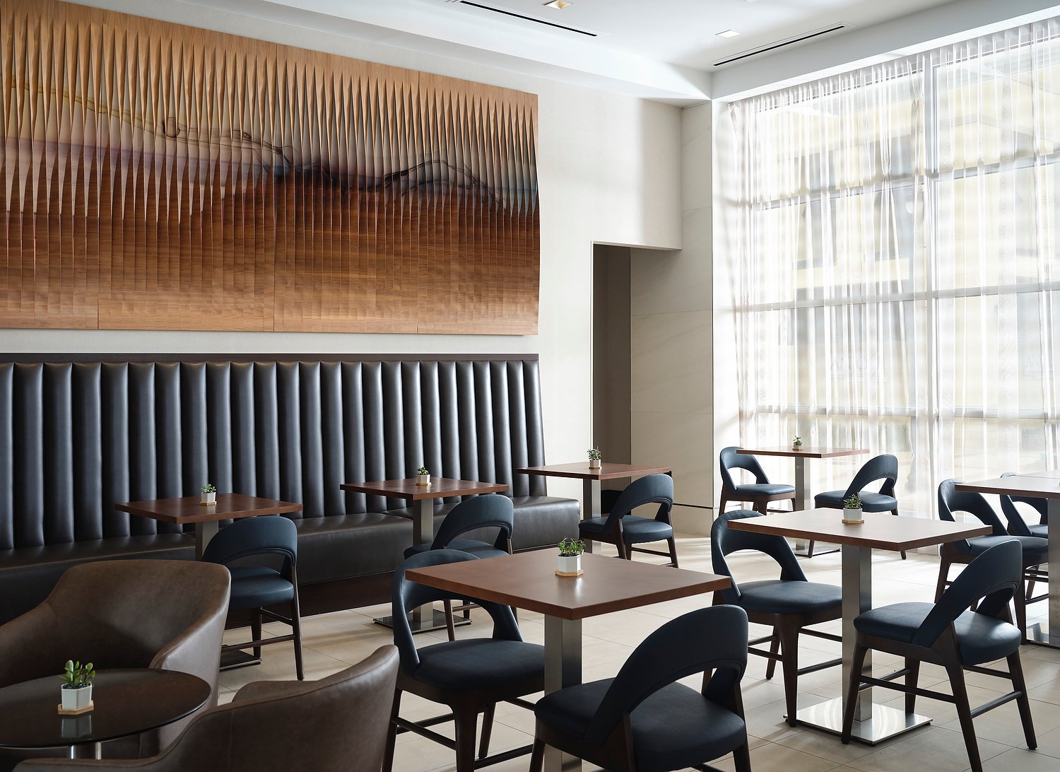 AC hotel breakfast eating area.JPEG