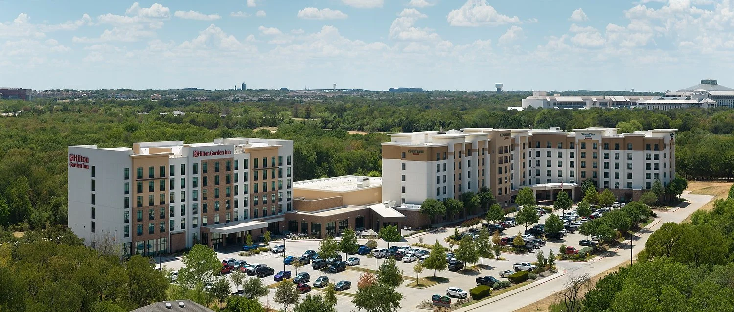 Dallas Hilton Garden Inn Grapevine aerial three hotels.JPG