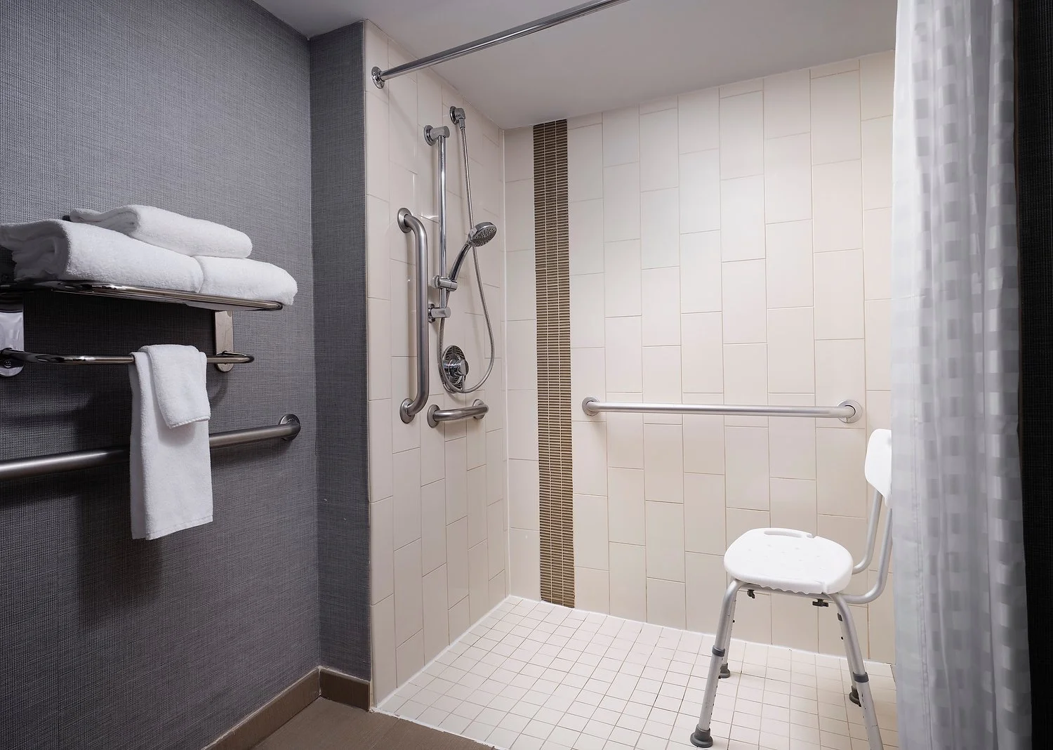 Dallas Hyatt Place room 209 ADA roll in bathroom.JPEG