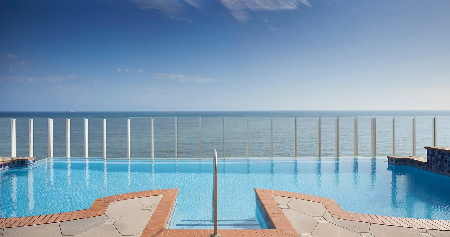 Virginia Beach Hilton pool with ocean.JPG