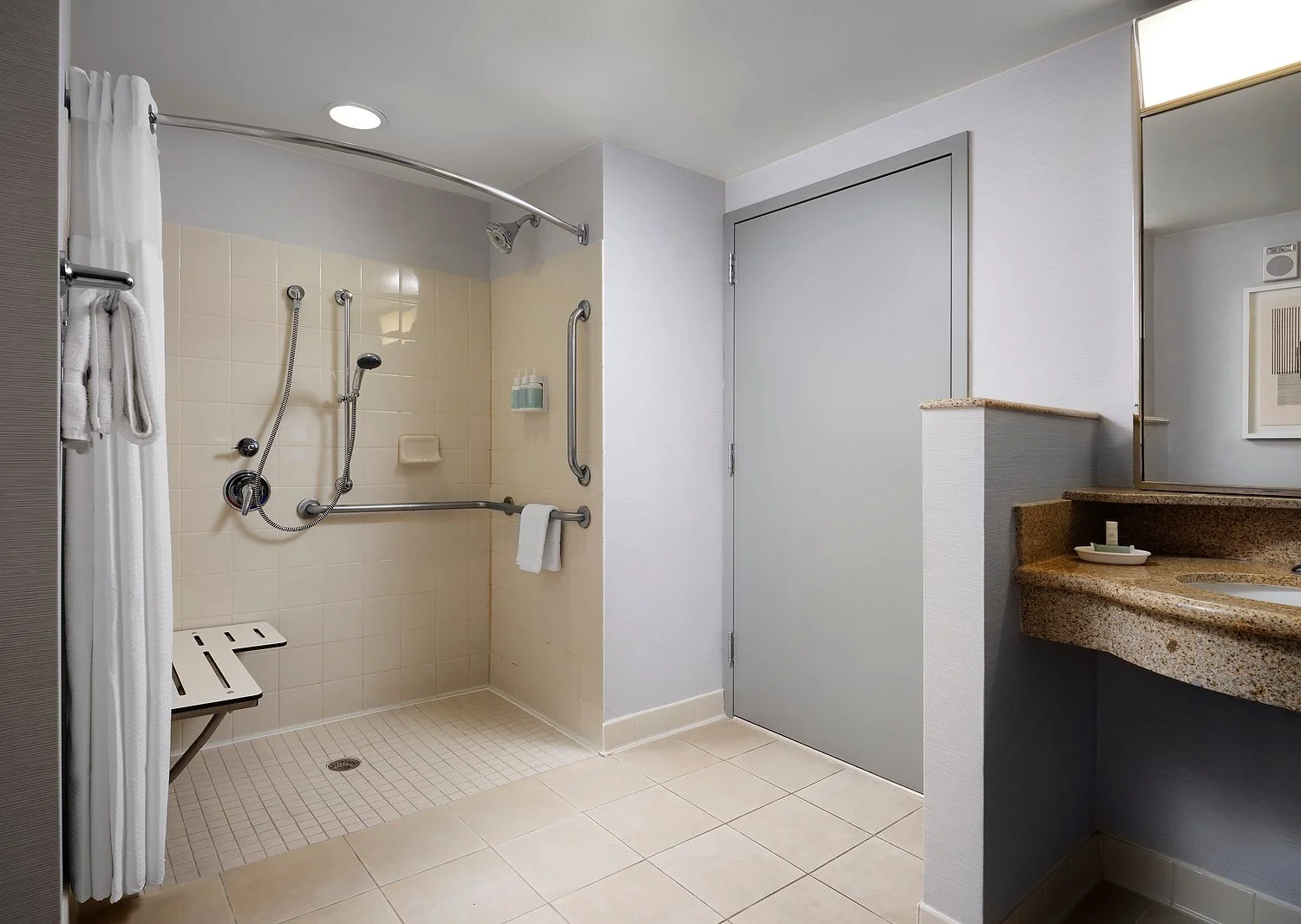 Courtyard Navy yard room 710 ADA Bath Roll-in.JPEG