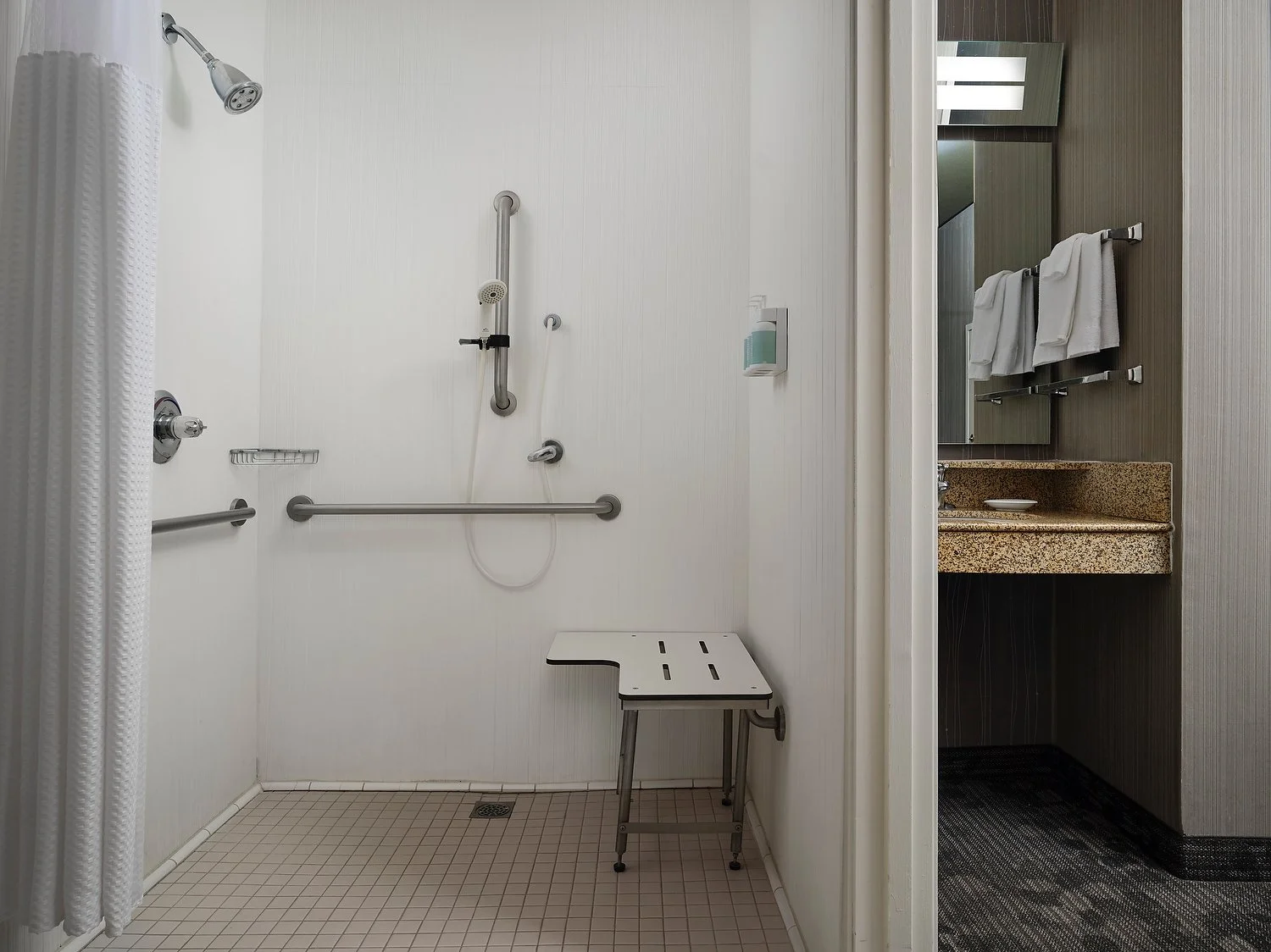 Stockton Courtyard room 109 ADA bathroom.JPEG