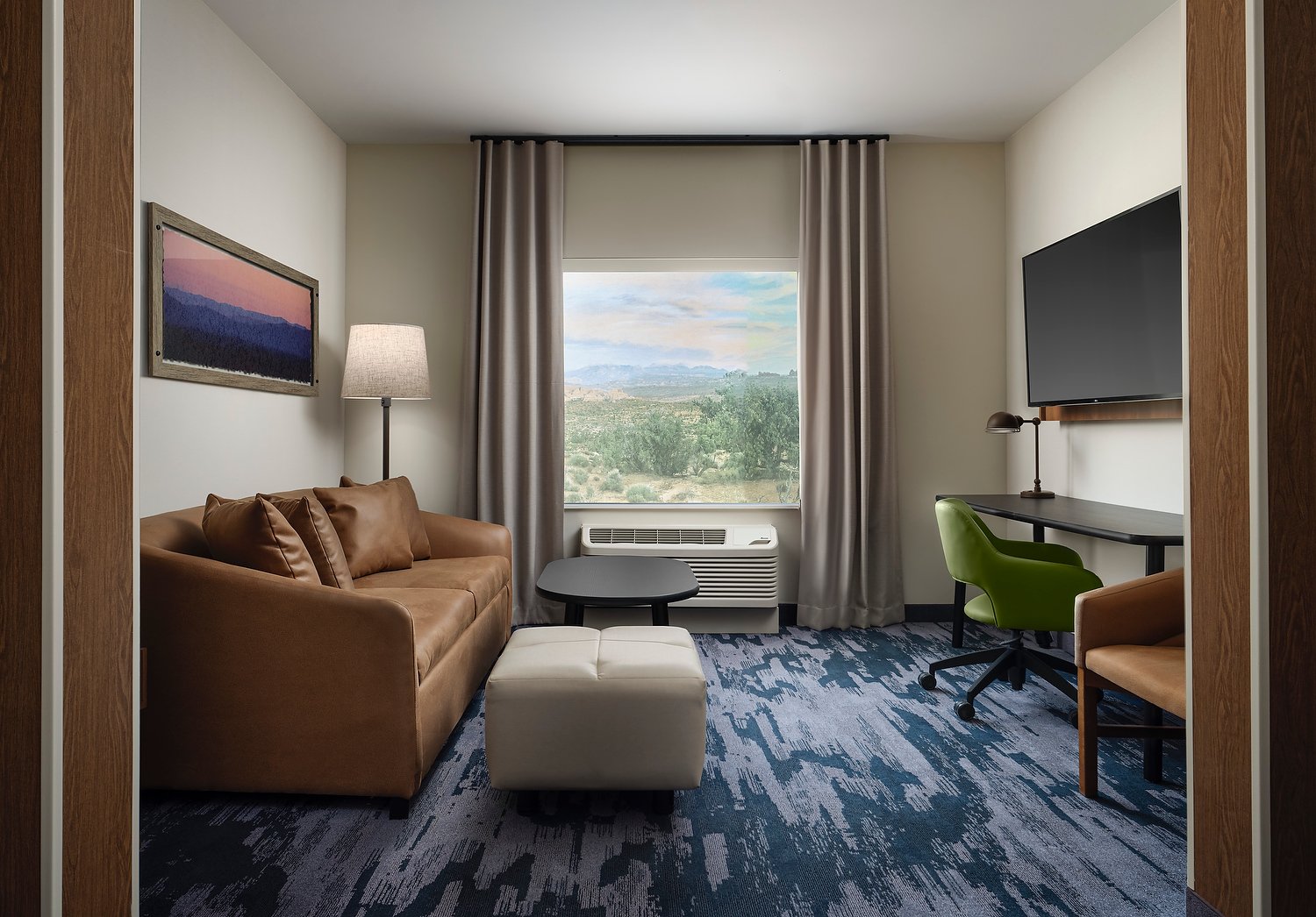 BARSTOW FF room 220 king suite living room v1.JPG