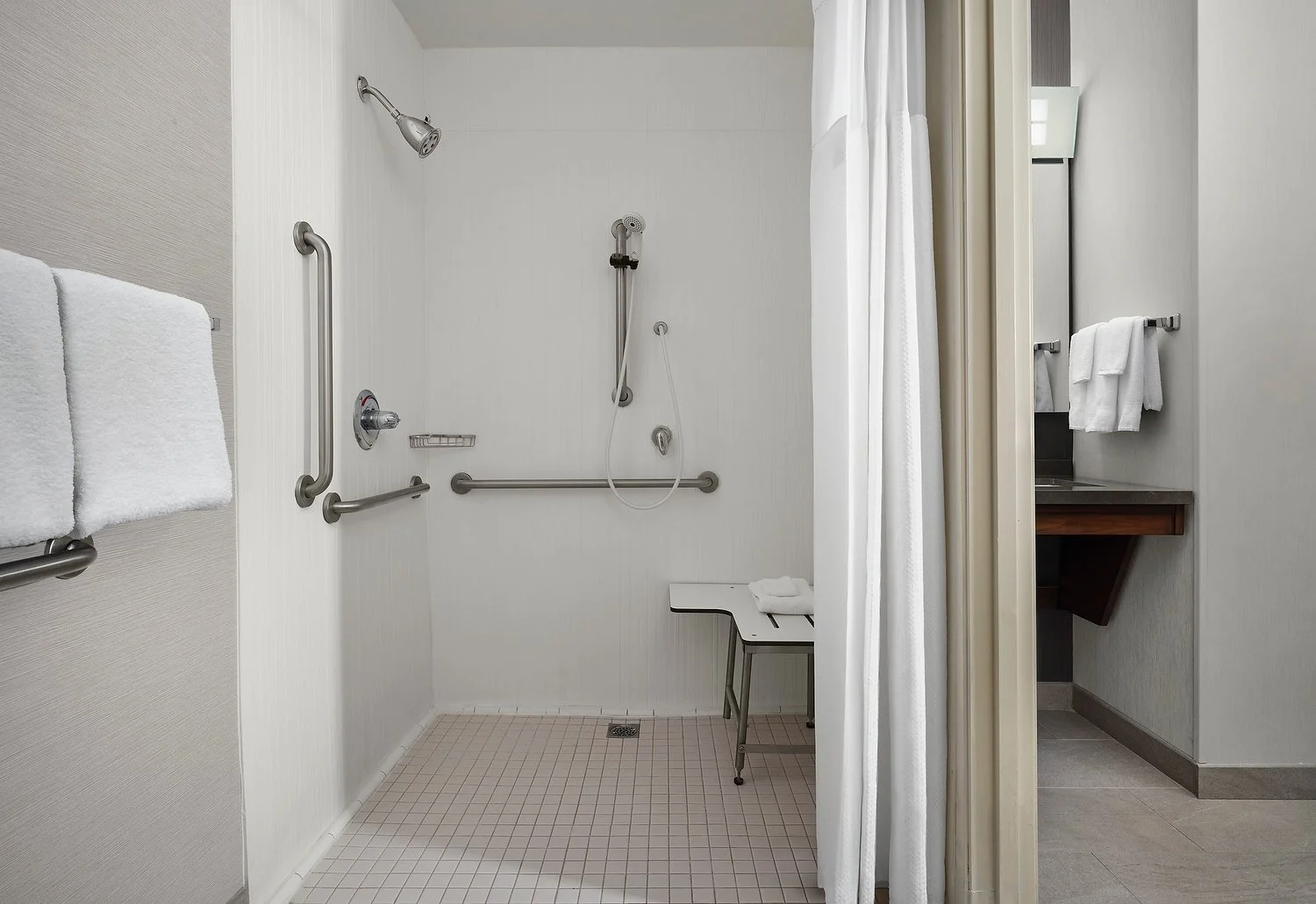 Stocton courtyard ADA roll-in shower v2.JPG