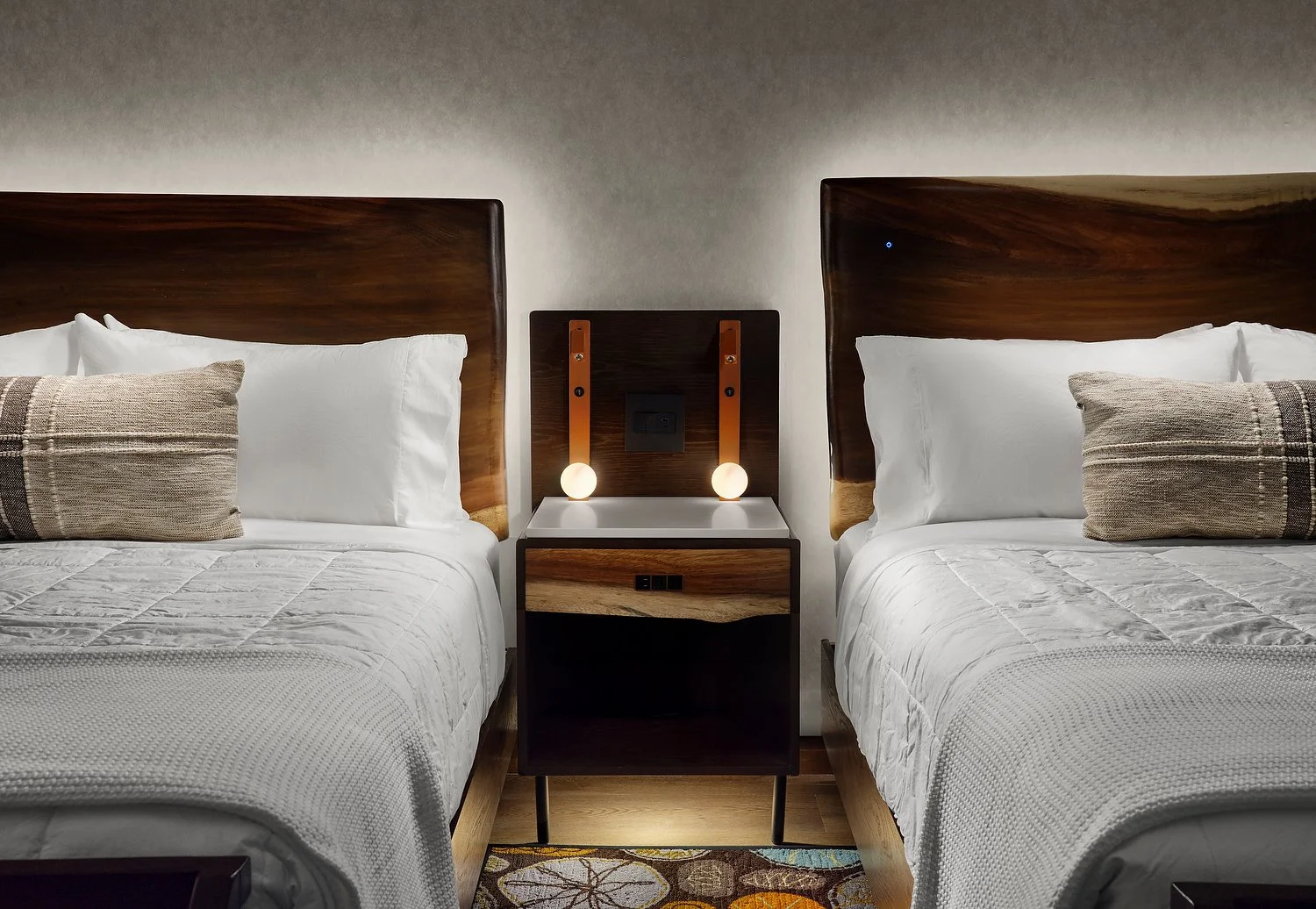 SANCTITY  HOTEL Room  302 double queen  headboard.JPG