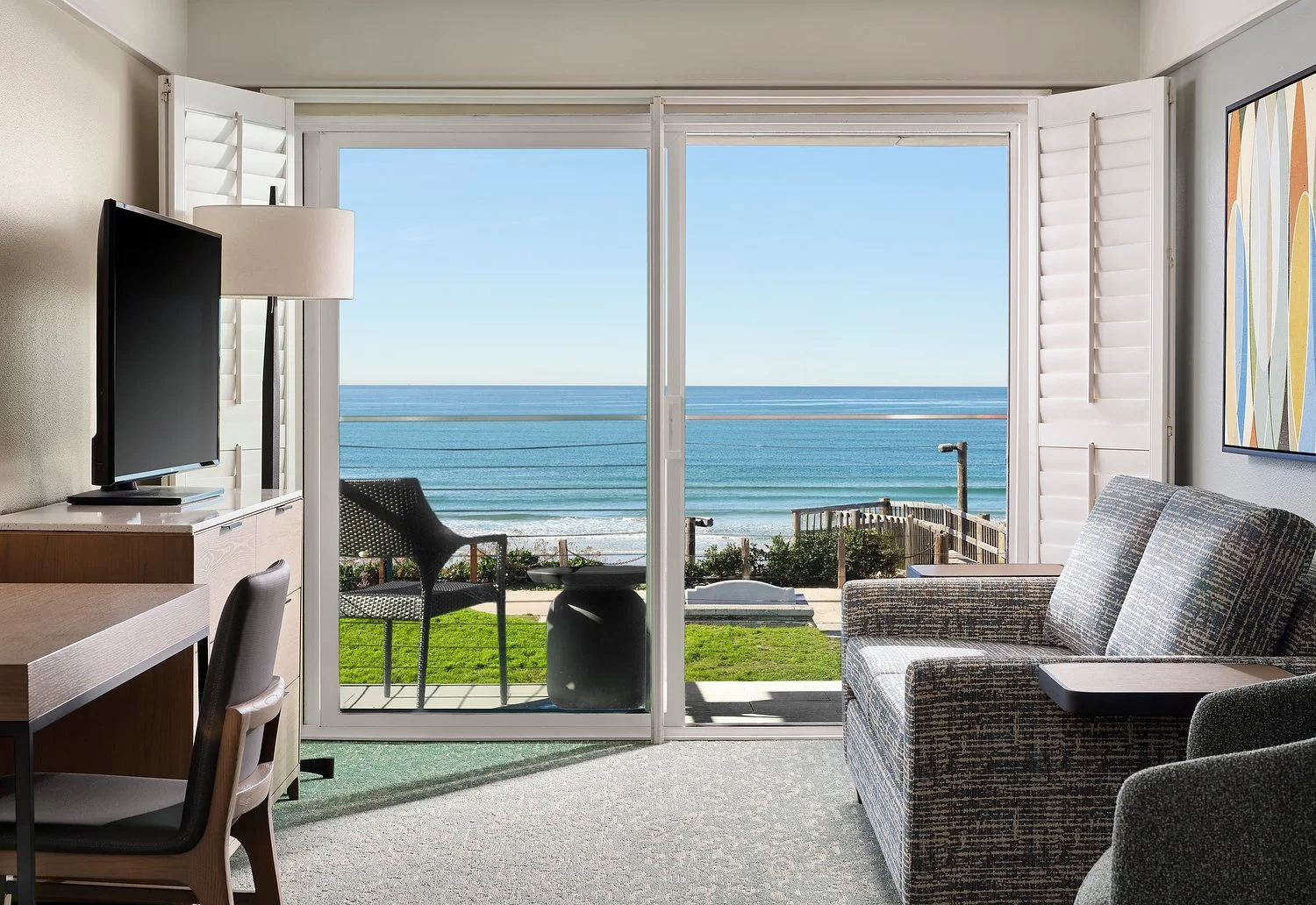 DIAMOND HEAD INN  room 201 king living ocean view.JPG