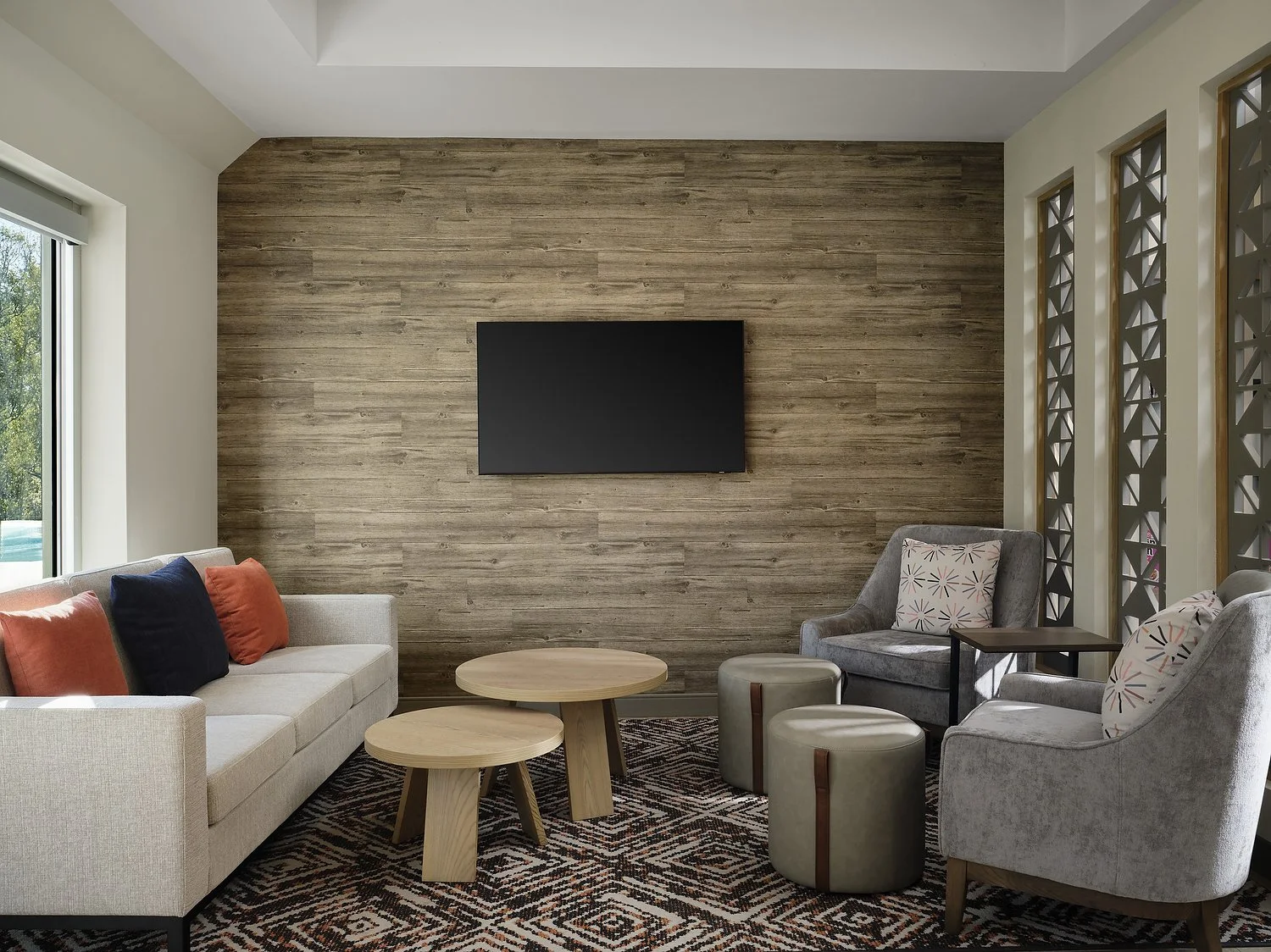 Mobile Candlewood Suites lobby tv area.JPG