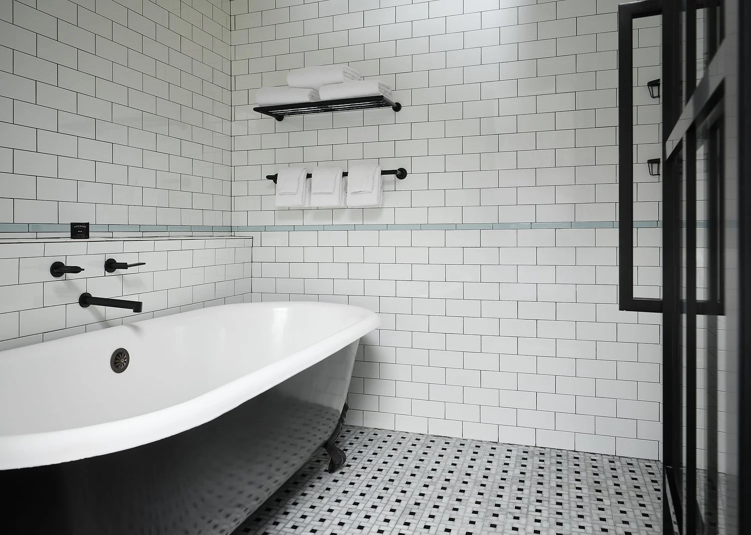 HOTEL THEODORE room 1008 king studio suite bath v2.JPG