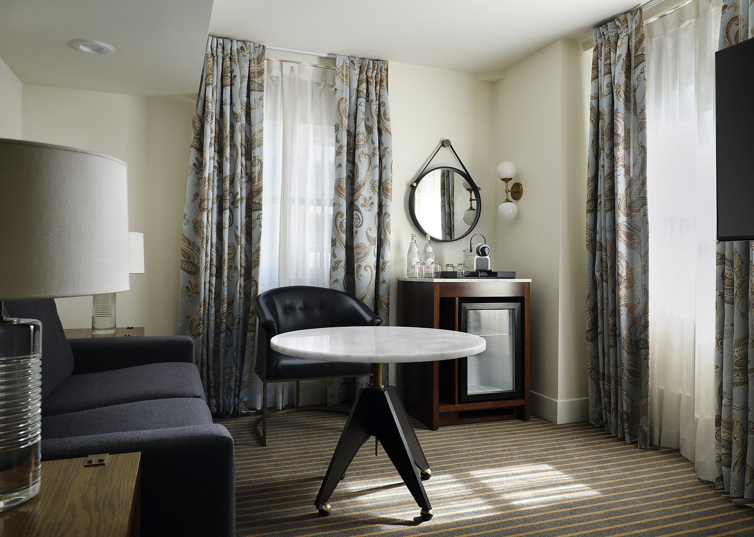 HOTEL THEODORE room 2001 queen studio suite living area A .JPG