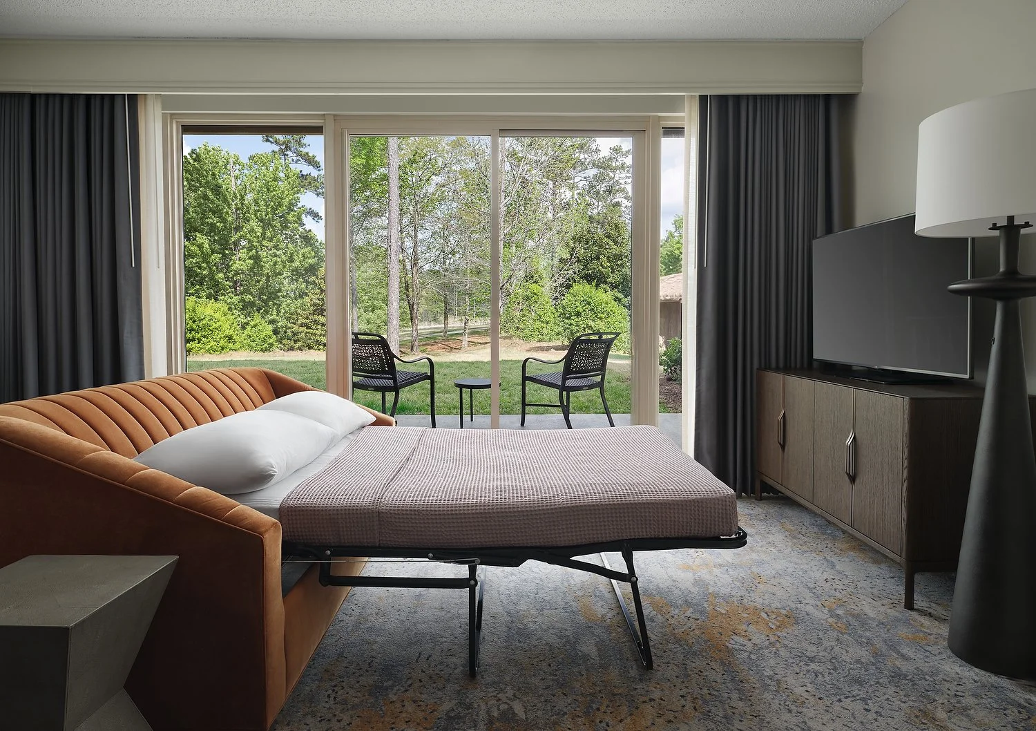 MH_CSGAB_rm132_exec_suite_sofabed.JPG