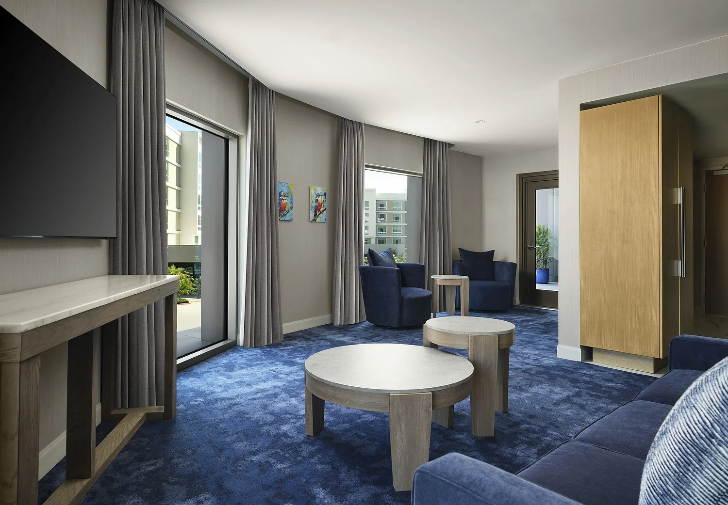 Arcadia Hillton room 377 ADA king suite living area.JPG