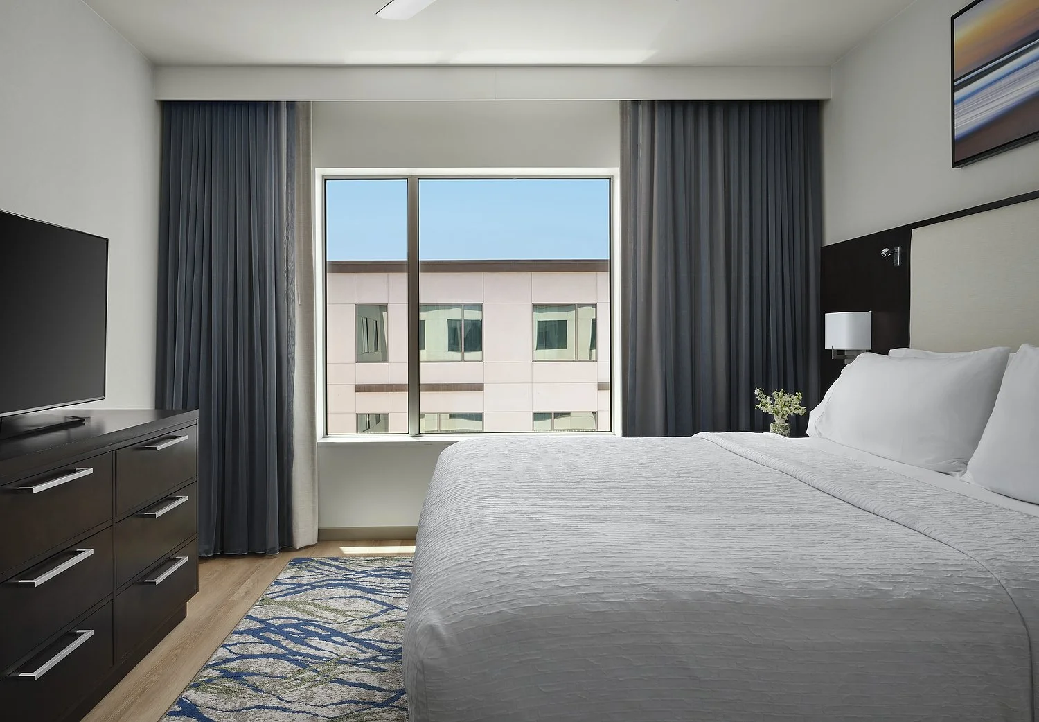 Homewood rm 656 one bedroom king bedroom.JPG