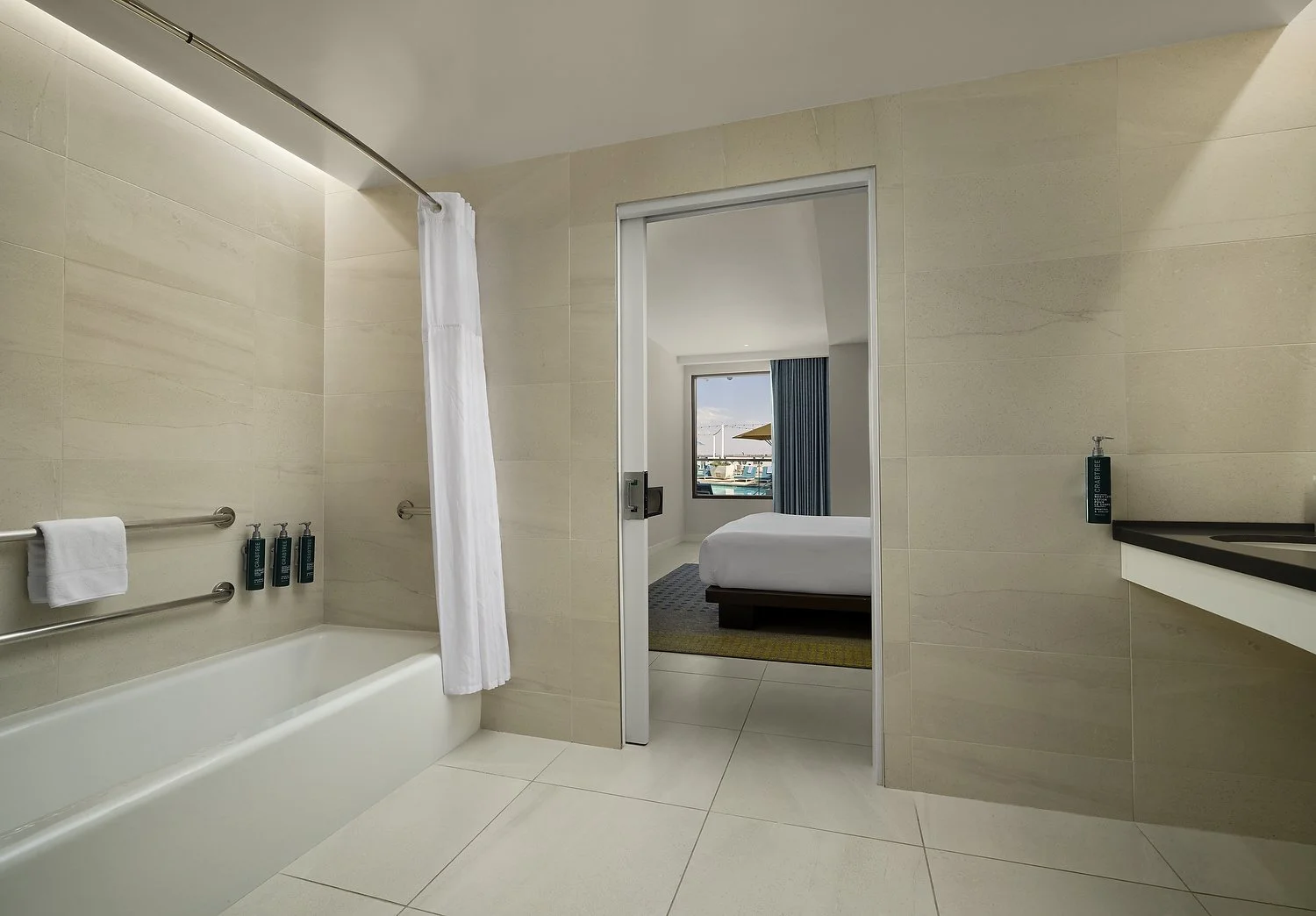 Buena Park Hilton room 439 king suite bath.JPG