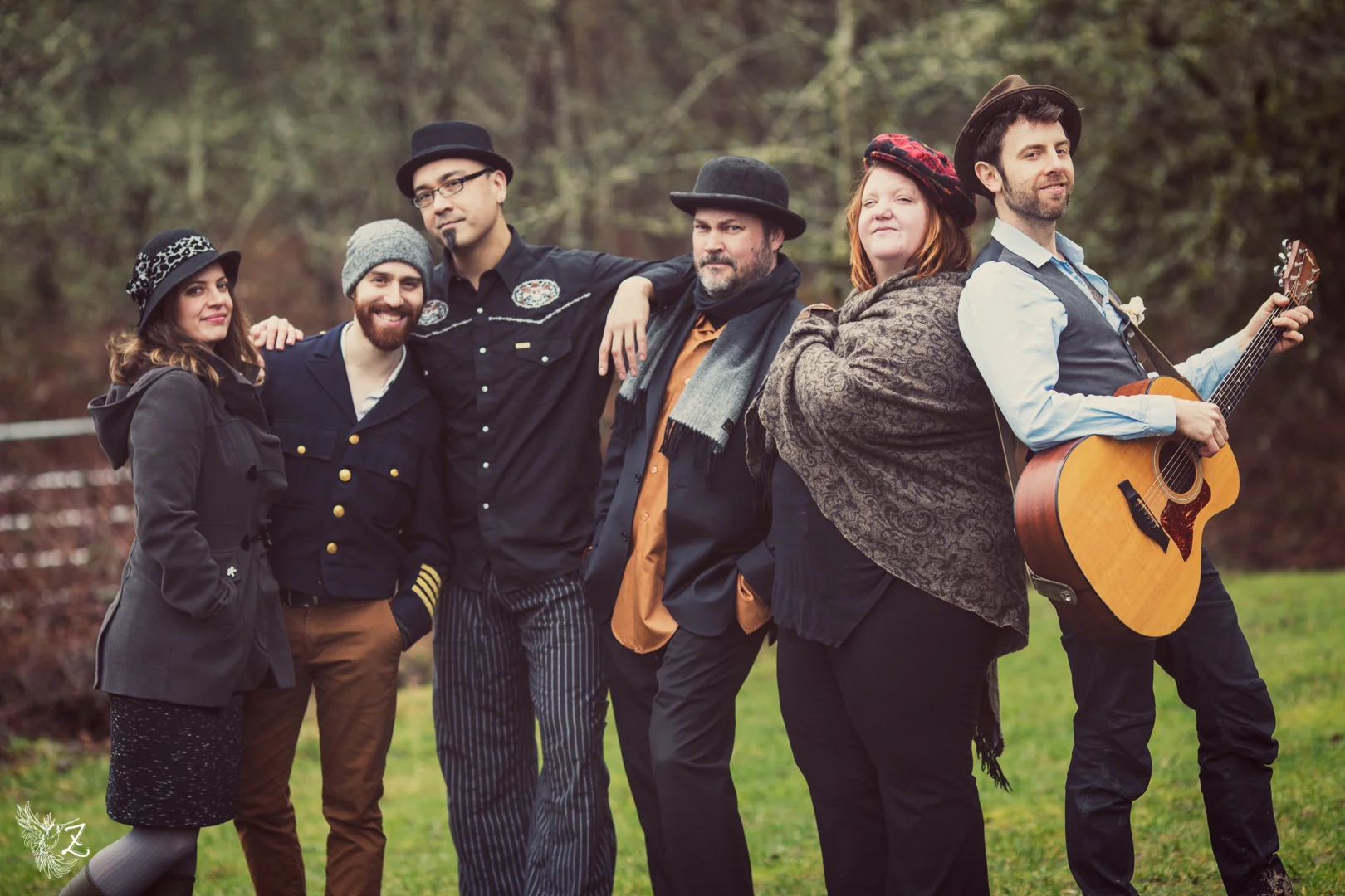 Band members (from left to right) Sophie Bloch - Violin, vocals Gil Assays - Keyboards Jason Flores - Bass David Langenes - Guitars Katie Presley - Trumpet and accordion Robin Jackson - Vocals, guitar, sax, clarinet and whistling Photo Credit: Zippy Lomax