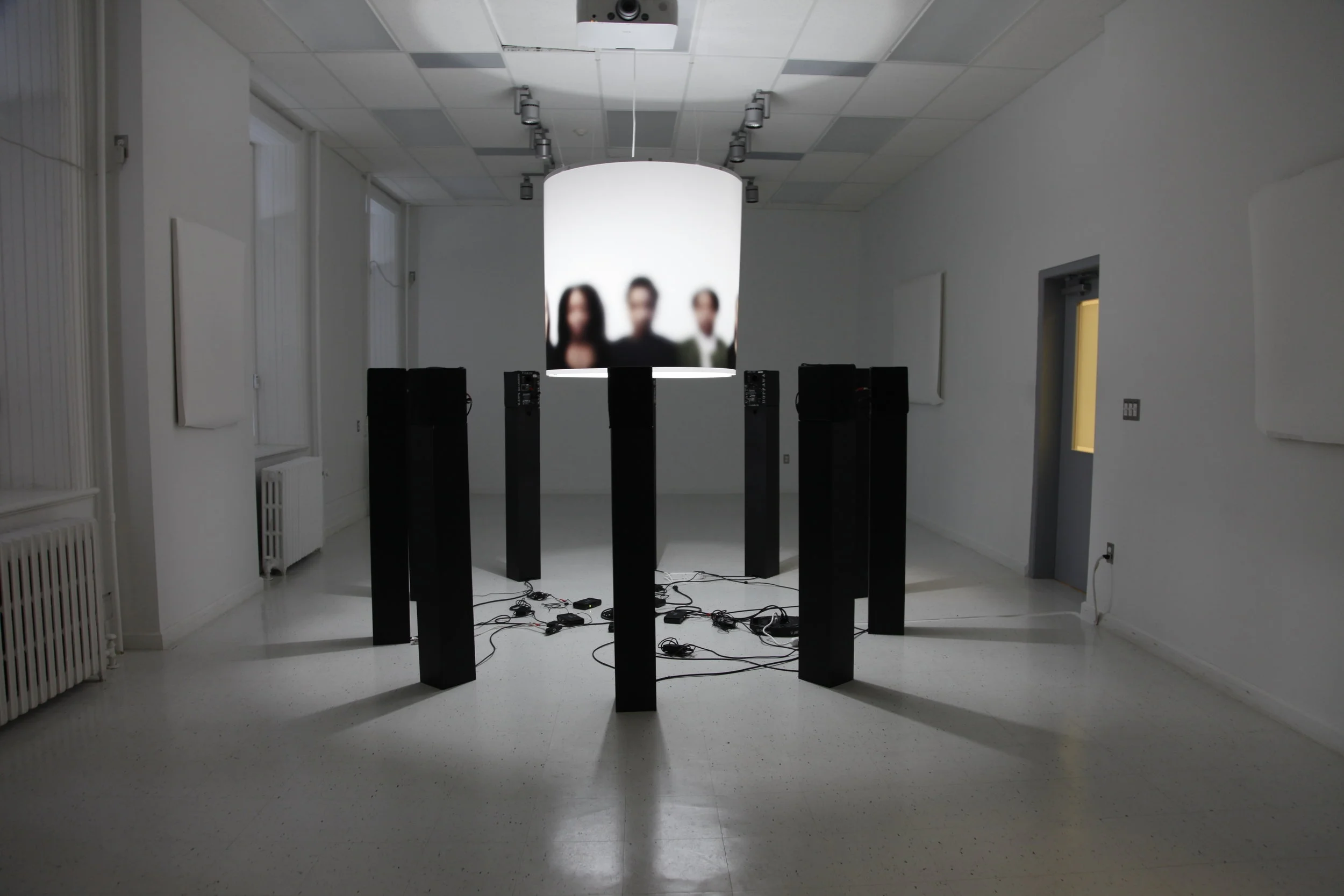 We Are Not Who We Are Oppressed to Be (Black Speakers, White Walls)