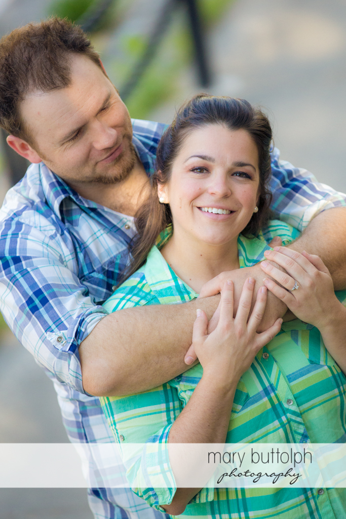 Couple pose for the camera at Skaneateles Engagement
