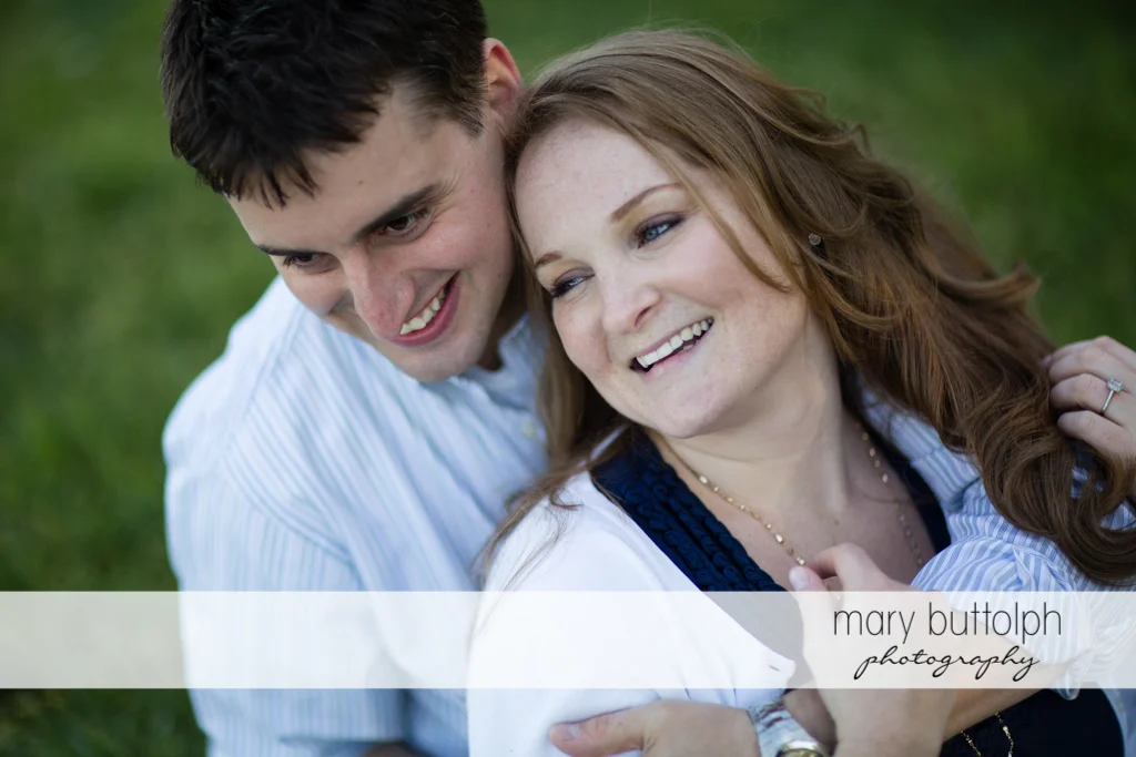 Close up shot of couple on the lawn at Lourdes Camp Engagement