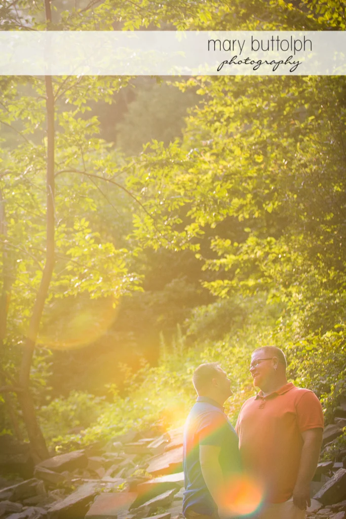 Same sex couple enjoy each other's company in the woods at Salmon River Falls Engagement