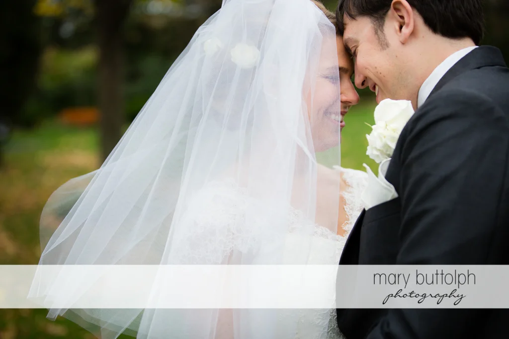 Couple get romantic in the woods at Traditions at the Links Wedding