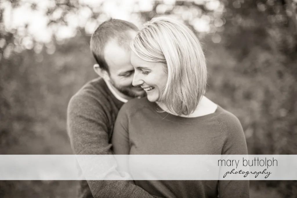 Couple in a romantic mood at Beak & Skiff Apple Orchards Engagement