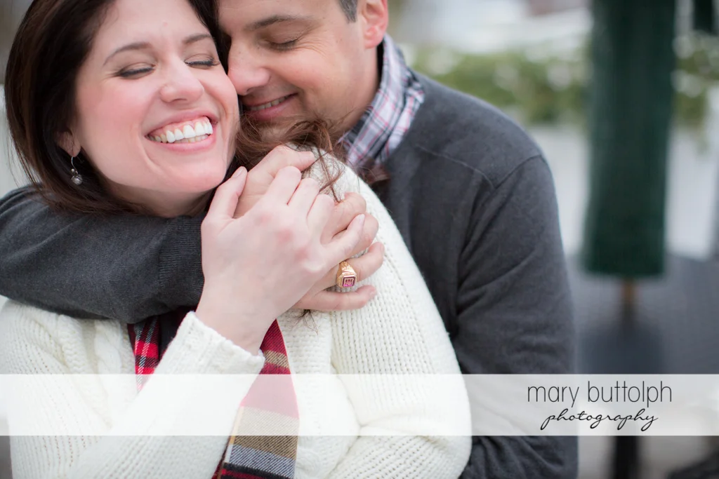 Couple share a tender moment at the Aurora Inn Engagement