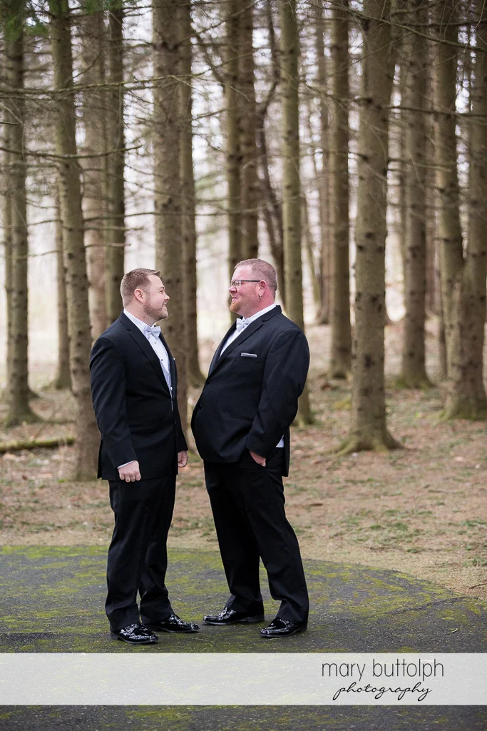 Same sex couple in the woods at Arrowhead Lodge Wedding