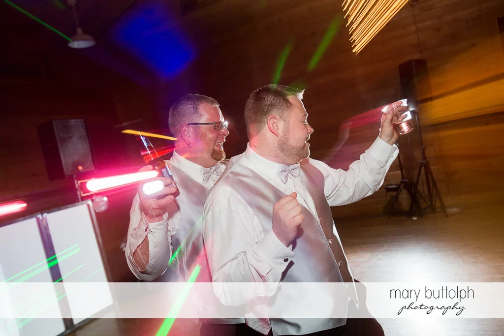 Same sex couple dance the night away at Arrowhead Lodge Wedding